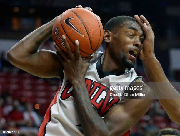 Roscoe Smith of the UNLV Rebels gets hit in the head as he rebounds the ball during a game against the UC Santa Barbara Gauchos at the Thomas & Mack...
