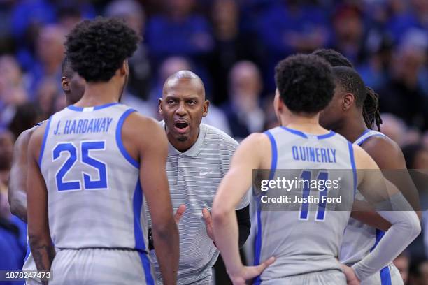 Head coach Penny Hardaway of the Memphis Tigers talks with his team during the second half against the Vanderbilt Commodores at FedExForum on...