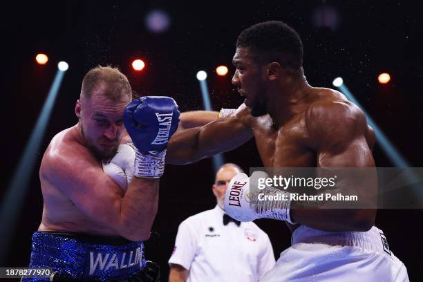 Anthony Joshua punches Otto Wallin during the Heavyweight fight between Anthony Joshua and Otto Wallin during the Day of Reckoning: Fight Night at...