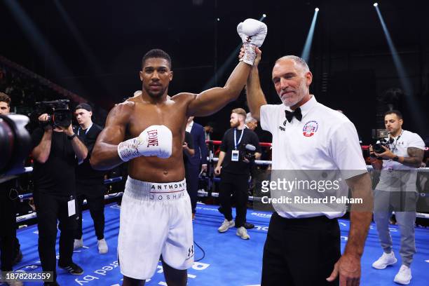Anthony Joshua celebrates victory as Referee Steve Gray announces him as winner following the Heavyweight fight between Anthony Joshua and Otto...