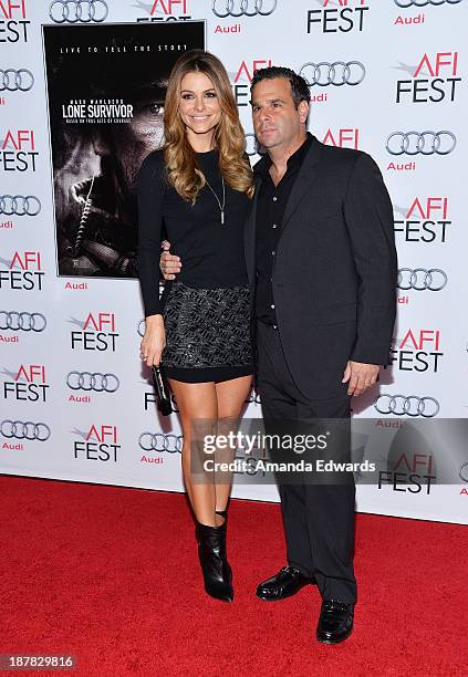 Television personality Maria Menounos and producer Randall Emmett arrive at the AFI FEST 2013 Presented By Audi - "Lone Survivor" premiere at TCL...