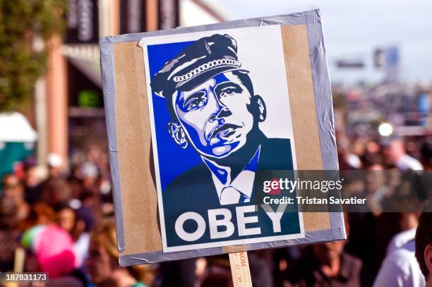 Spoof of famous Obama's "HOPE" poster, at the Folsom Street Fair. The original "HOPE" poster was designed by Shepard Fairey, who also created "OBEY"...