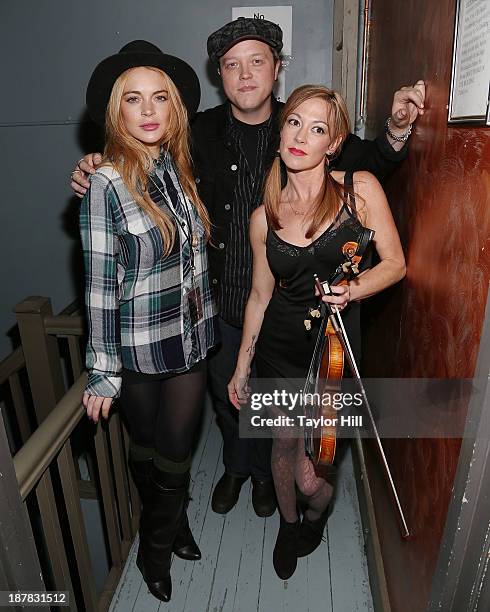 Actress Lindsay Lohan, musician Jason Isbell, and violinist Amanda Shires attend Dylan Fest NYC 2013>> at the Bowery Ballroom on November 12, 2013 in...