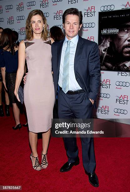 Actor Mark Wahlberg and his wife Rhea Durham arrive at the AFI FEST 2013 Presented By Audi - "Lone Survivor" Premiere at TCL Chinese Theatre on...