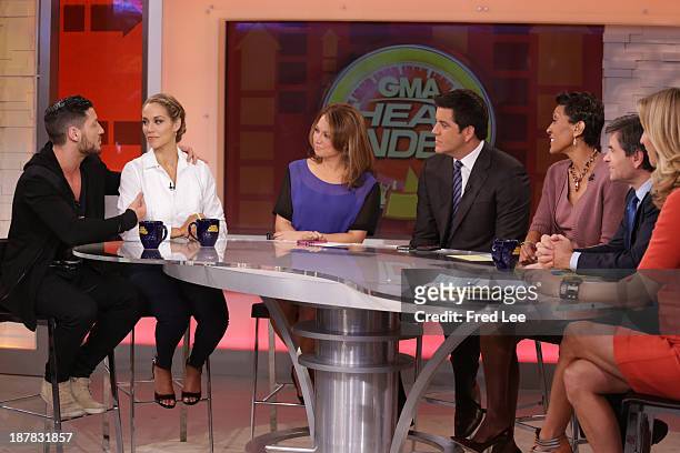 After being eliminated from "Dancing with the Stars" Elizabeth Berkley Lauren and Val Chmerkovskiy appear on "Good Morning America," 11/12/13, airing...