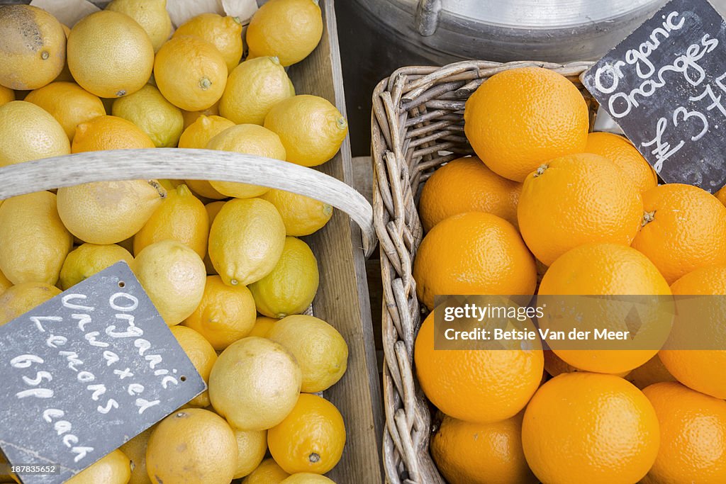 Baskets with organic oranges and lemons