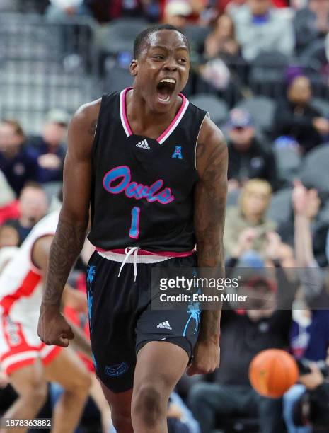Johnell Davis of the Florida Atlantic Owls reacts after hitting a 3-pointer against the Arizona Wildcats in the second half of the Desert Classic at...