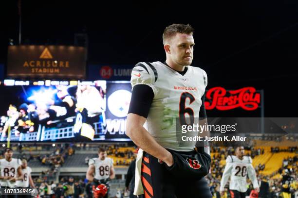 Jake Browning of the Cincinnati Bengals walks off the field after a game against the Pittsburgh Steelers at Acrisure Stadium on December 23, 2023 in...