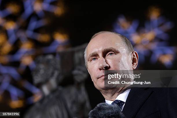 Russian President Vladimir Putin speaks during the unveiling ceremony of Pushkin statue at Lotte Hotel Seoul on November 13, 2013 in Seoul, South...