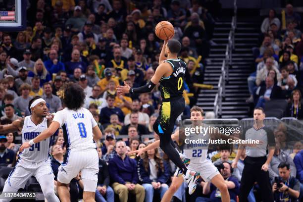 Tyrese Haliburton of the Indiana Pacers takes a shot during the first half in the game against the Orlando Magic at Gainbridge Fieldhouse on December...