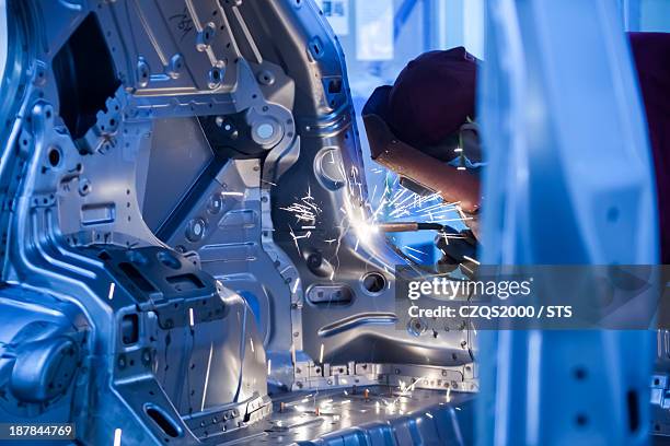 Assembly Line Driver 14,571 Auto Worker Assembly Line Stock Photos, High-Res Pictures, and ...