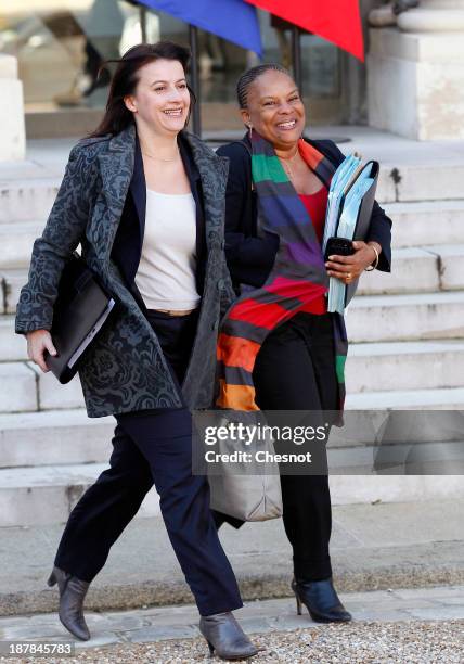 French Housing Minister Cecile Duflot and French Justice Minister Christiane Taubira leave the Elysee Palace after the weekly cabinet meeting on...