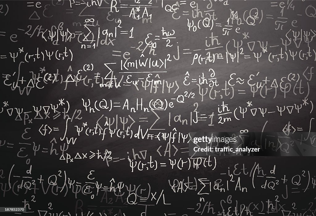 Fisica quantistica formule sulla lavagna