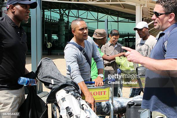 In this handout image provided by the ITM Group, Brian Baloyi and Standton Fredericks during the Liverpool FC Legends Tour arrival at King Shaka...