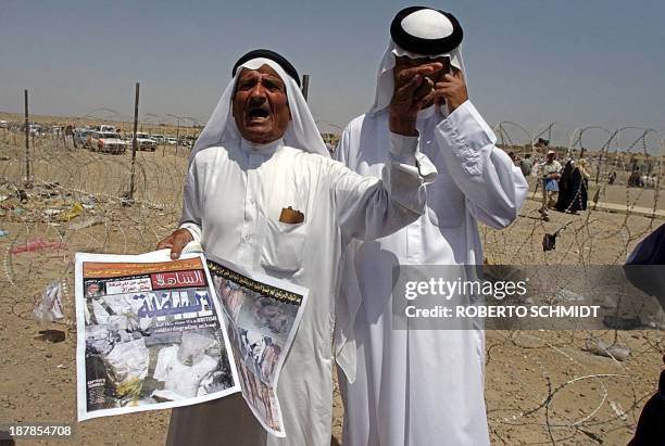 Relatives of Iraqi prisoners being held by US authorities at the Abu Ghraib prison denounce 08 May 2004 the treatment that the prisoners are...