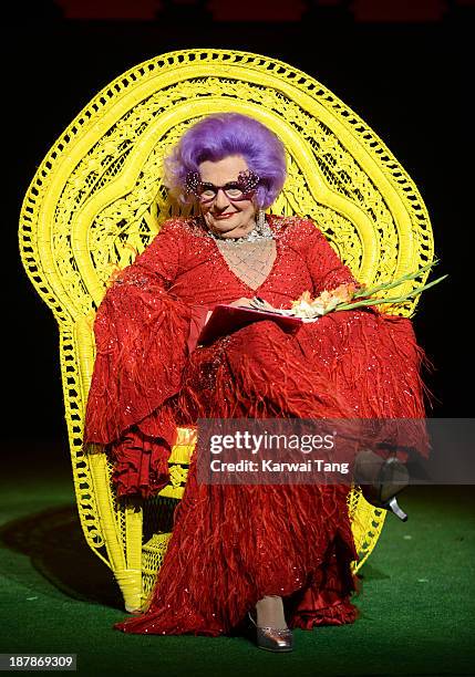 Australian comedian Barry Humphries attends a photocall to promote the Dame Edna Farewell tour on November 13, 2013 in London, England.