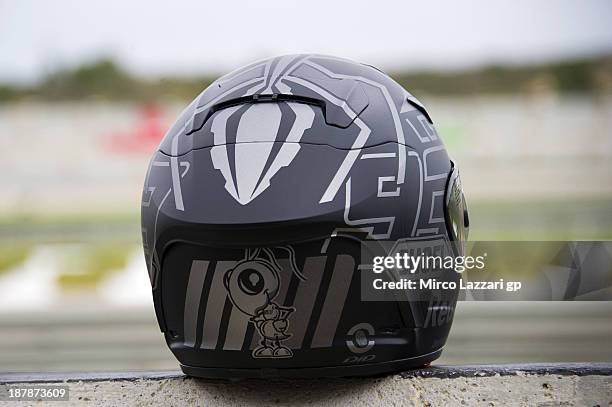 The new helmet of Marc Marquez of Spain and Repsol Honda Team in pit during day 3 of MotoGP tests at Ricardo Tormo Circuit on November 13, 2013 in...
