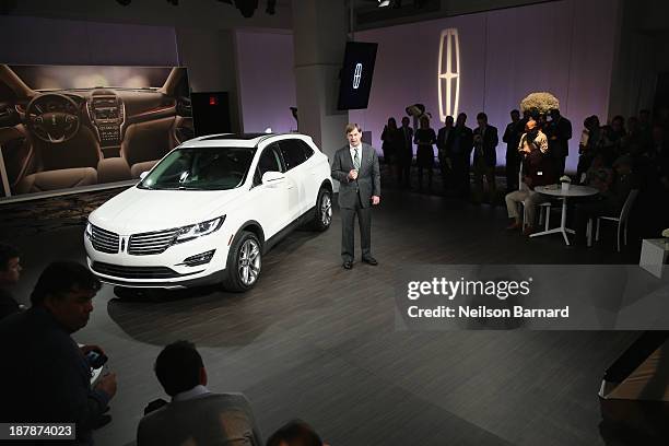 Executive VP of global marketing, sale and service, and Lincoln Jim Farley speaks at the reveal event for the all-new 2015 Lincoln MKC on November...