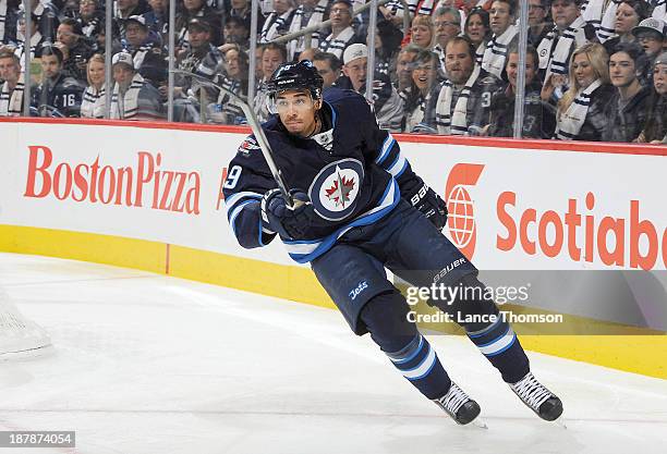 Evander Kane of the Winnipeg Jets follows the play up the ice during first period action against the Chicago Blackhawks at the MTS Centre on November...