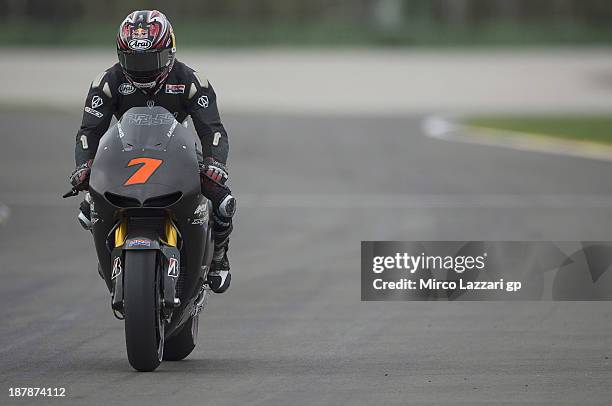 Hiroshi Aoyama of Japan and Power Electronics Aspar heads down a straight during day 3 of MotoGP tests at Ricardo Tormo Circuit on November 13, 2013...