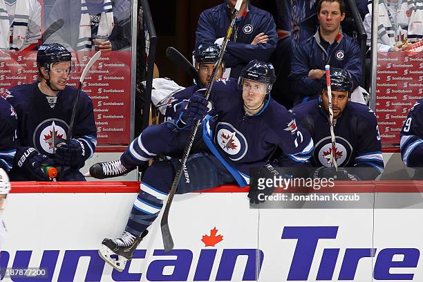 James Wright of the Winnipeg Jets jumps off the bench during first period action against the Chicago Blackhawks at the MTS Centre on November 2, 2013...