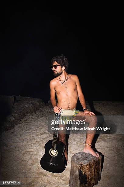 a funny man playing music in underwear - honduran jokes stock-fotos und bilder