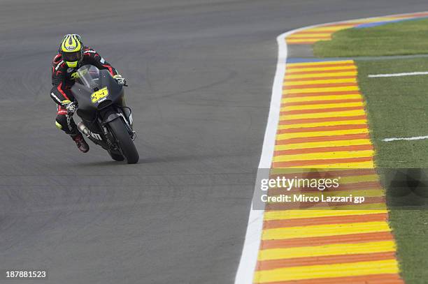 Cal Crutchlow of Great Britain and Ducati team heads down a straight during day 3 of MotoGP tests at Ricardo Tormo Circuit on November 13, 2013 in...