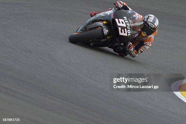 Marc Marquez of Spain and Repsol Honda Team rounds the bend during day 3 of MotoGP tests at Ricardo Tormo Circuit on November 13, 2013 in Valencia,...