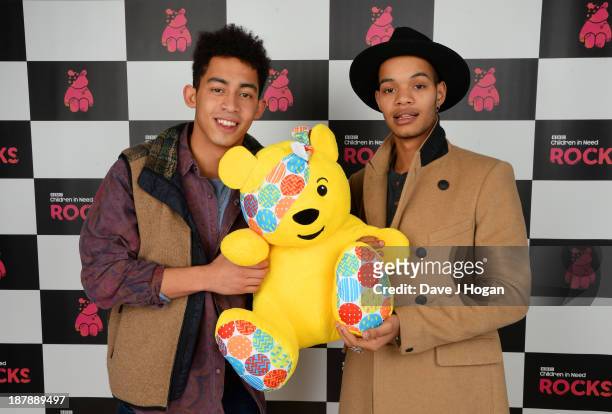 Jordan Stephens, Harley Alexander-Sule of Rizzle Kicks pose with Pudsey Bear backstage during the 'BBC Children In Need Rocks' at Hammersmith Eventim...