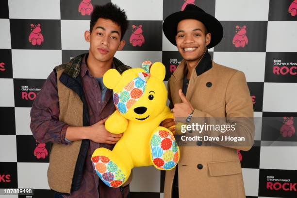 Jordan Stephens, Harley Alexander-Sule of Rizzle Kicks pose with Pudsey Bear backstage during the 'BBC Children In Need Rocks' at Hammersmith Eventim...