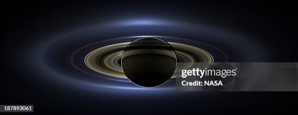 In this handout from NASA, the planet Saturn is seen backlit by the sun, sent Cassini spacecraft July 19, 2013 in space. NASA unvieled the image,...