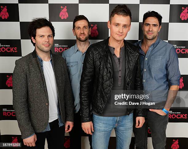 Jesse Quinn, Richard Hughes, Tom Chaplin and Tim Rice-Oxley of Keane pose backstage during the 'BBC Children In Need Rocks' at Hammersmith Eventim on...