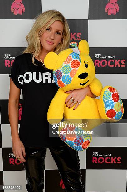 Ellie Goulding poses with Pudsey Bear backstage during the 'BBC Children In Need Rocks' at Hammersmith Eventim on November 13, 2013 in London,...