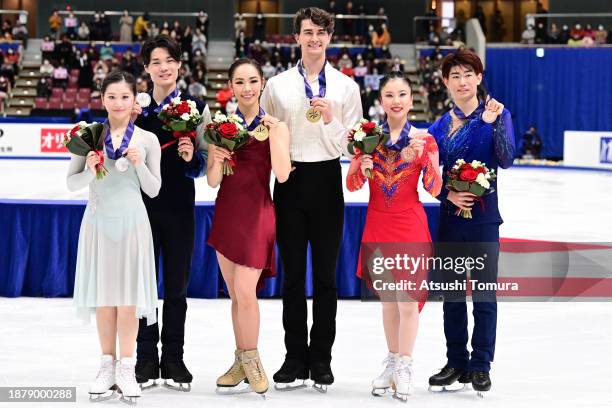 Azusa Tanaka and Shingo Nishiyama , Misato Komatsubara and Takeru Komatsubara , Utana Yoshida and Masaya Morita pose with medals during day four of...