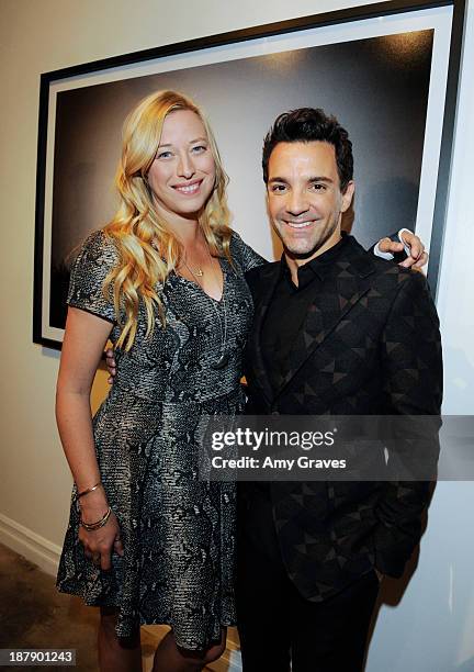 Beth Yorn and George Kotsiopoulos attend the Beth Yorn Photography Show at Roseark on November 7, 2013 in West Hollywood, California.