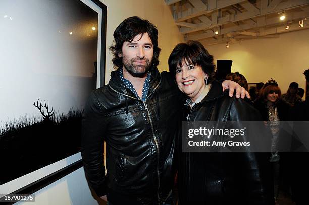 Pete Yorn and his mother attend the Beth Yorn Photography Show at Roseark on November 7, 2013 in West Hollywood, California.