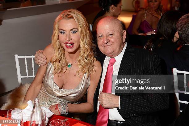 Massimo Boldi and Valeria Marini attend the Gala Telethon 2013 Roma during The 8th Rome Film Festival on November 13, 2013 in Rome, Italy