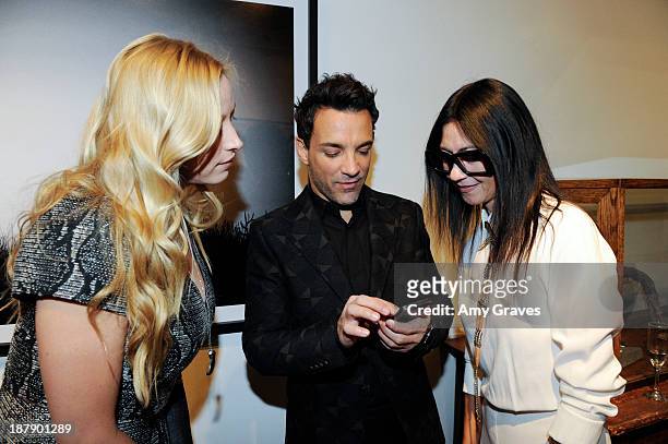 Beth Yorn, George Kotsiopulos and Magda Berliner attend the Beth Yorn Photography Show at Roseark on November 7, 2013 in West Hollywood, California.