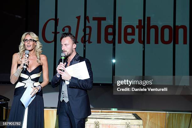 Tiziana Rocca and Francesco Facchinetti attend the Gala Telethon 2013 Roma during The 8th Rome Film Festival on November 13, 2013 in Rome, Italy