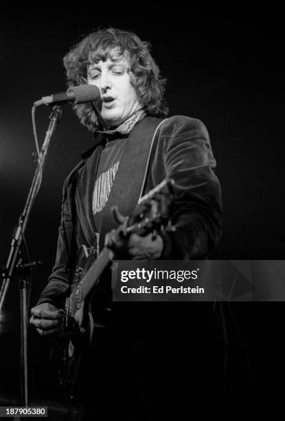 Bone Burnett performs with the Alpha Band at Winterland Arena on January 29, 1977 in San Francisco, California.