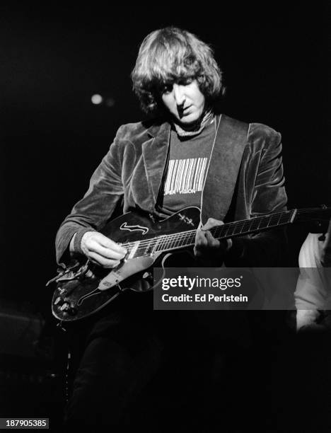 Bone Burnett performs with the Alpha Band at Winterland Arena on January 29, 1977 in San Francisco, California.