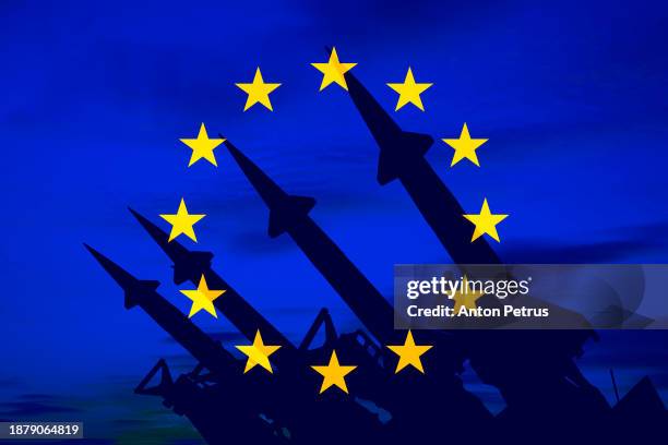 missile system on the background of the eu flag - industria della difesa foto e immagini stock