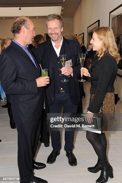 Hugo Burnand attends the private view of ENCOUNTER the stunning wildlife photography of David Yarrow at Saatchi Gallery on November 13, 2013 in...