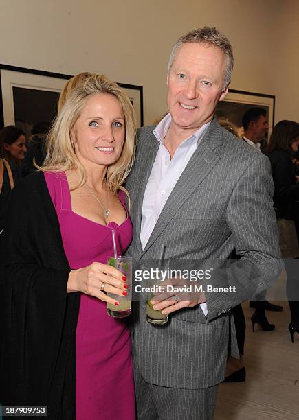 Tessa Campbell Fraser and Rory Bremner attend the private view of ENCOUNTER the stunning wildlife photography of David Yarrow at Saatchi Gallery on...