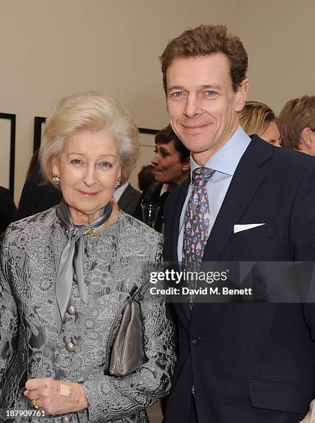 Princess Alexandra and James Ogilvy attend the private view of ENCOUNTER the stunning wildlife photography of David Yarrow at Saatchi Gallery on...