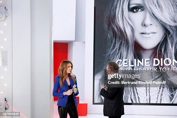 Singer Celine Dion and the presenter of the show Michel Drucker attend the 'Vivement Dimanche' French TV Show, held at Pavillon Gabriel on November...