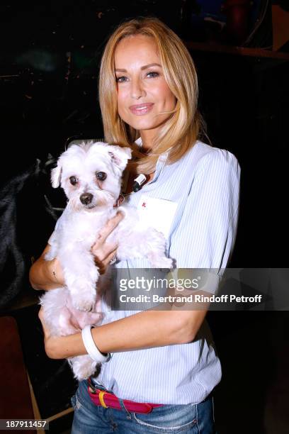 Main guest of the show Adriana Karembeu and her dog Tarzan attend the 'Vivement Dimanche' French TV Show, held at Pavillon Gabriel on November 13,...