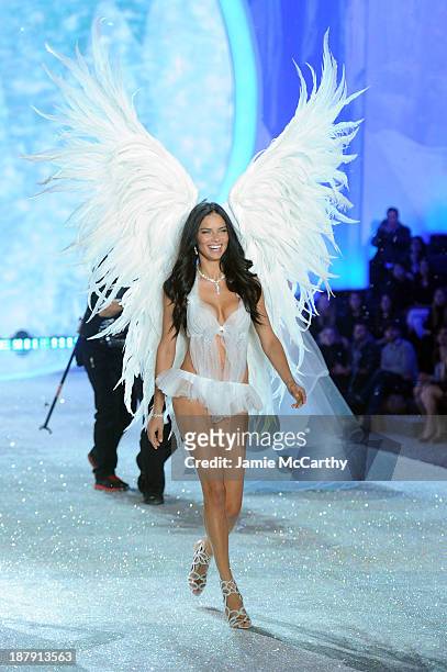 Model Adriana Lima walks the runway at the 2013 Victoria's Secret Fashion Show at Lexington Avenue Armory on November 13, 2013 in New York City.