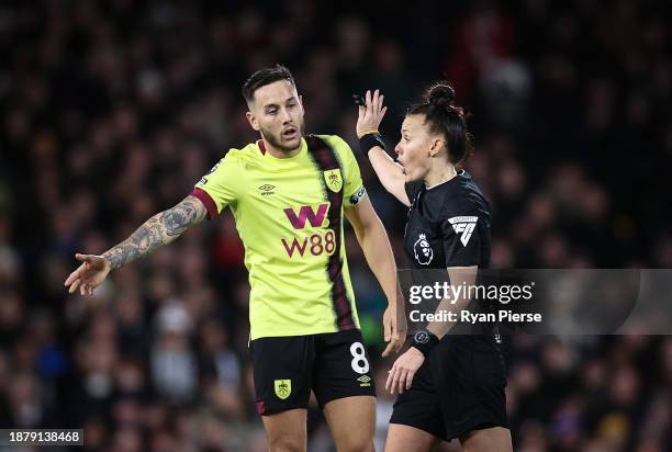 Josh Brownhill of Burnley questions a decision by Referee Rebecca Welch as she becomes the first woman to referee a Premier League match, during the...