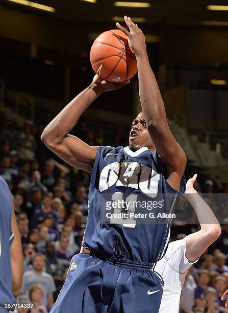 Guard Shawn Glover of the Oral Roberts Golden Eagles puts up a shot against the Kansas State Wildcats during the first half on November 13, 2013 at...